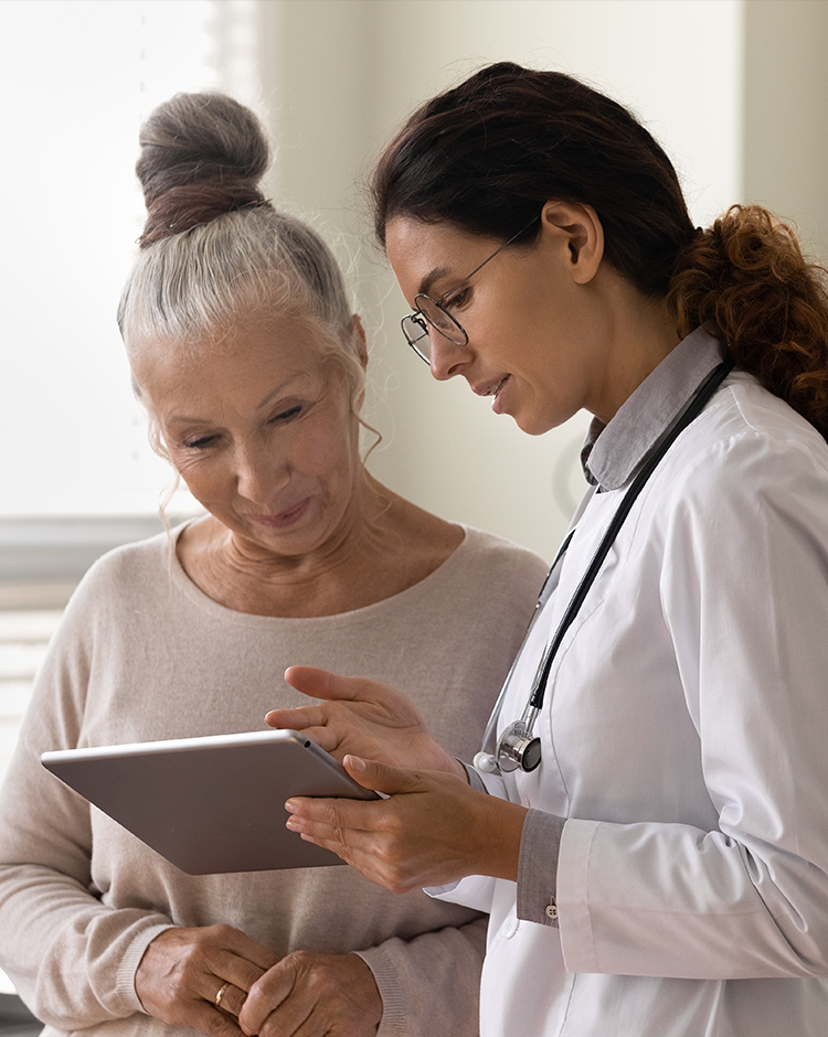 Caring doctor talking to a patient